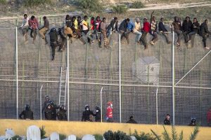 Migrants set for confrontation with Spanish Border Police standing between them and the perceived wonderland